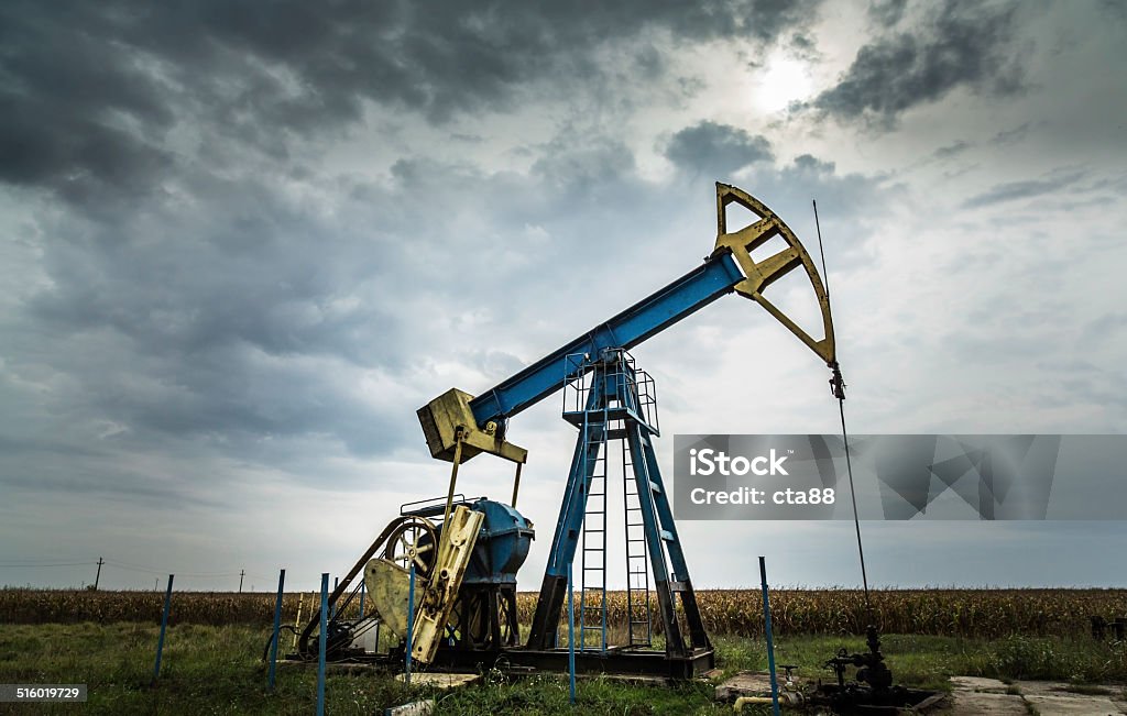Operating oil and gas well Operating oil and gas well in remote rural area Fracking Stock Photo