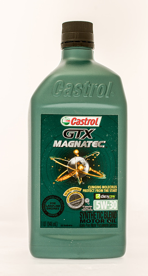 Winneconne, WI, USA - 8 Sept 2015:  A quart of Castrol GTX magnatec synthetic motor oil.