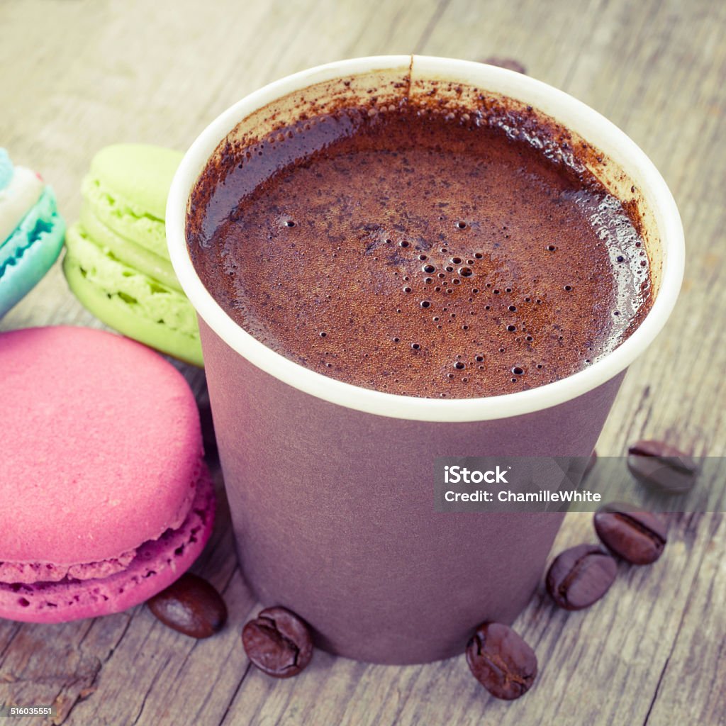 macaroons and espresso coffee  on old wooden rustic table macaroons and espresso coffee  on old wooden rustic table, vintage stylized Cup Stock Photo
