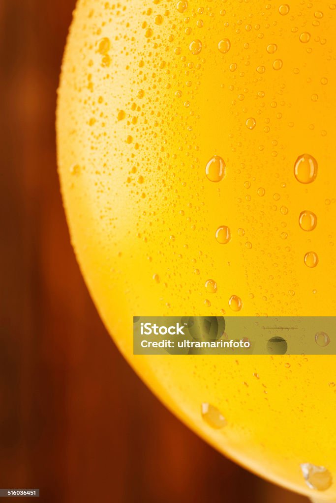 Beer Ice Cold  Glass of  Beer , covered with water drops - condensation. Very shallow DOF . Alcohol - Drink Stock Photo