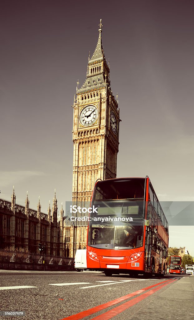 London bus in front of Big Ben Red doubledecker bus in front of Big Ben in London, toned image Architecture Stock Photo