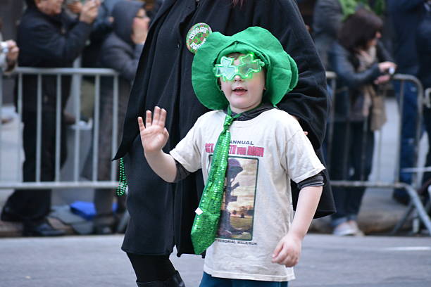 New York City, USA - March 16, 2016: Young child  marching in the St. Patrick's Day Parade in Midtown Manhattan in 2016.