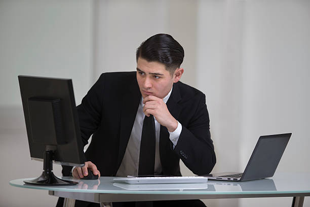 istock Businessman Working Hard at His Desk 516037979
