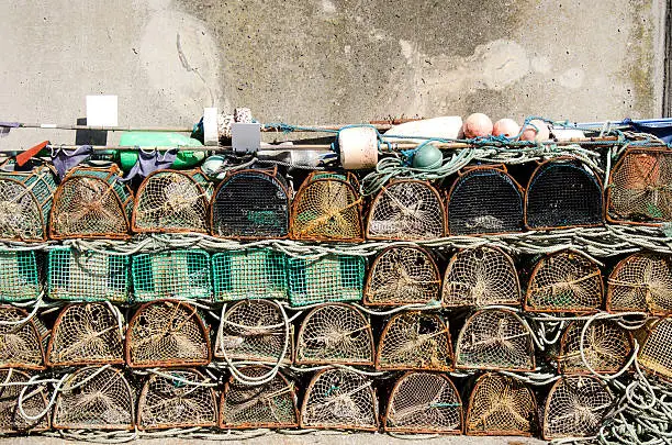 Photo in a port of fishingnets and ropes with sunlight