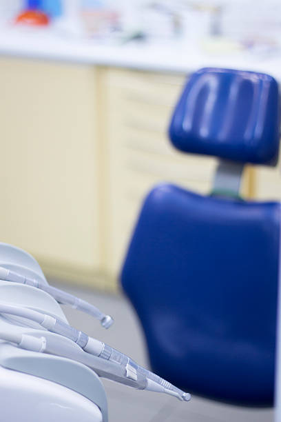 istock Dentist's chair and dental drill 516038522