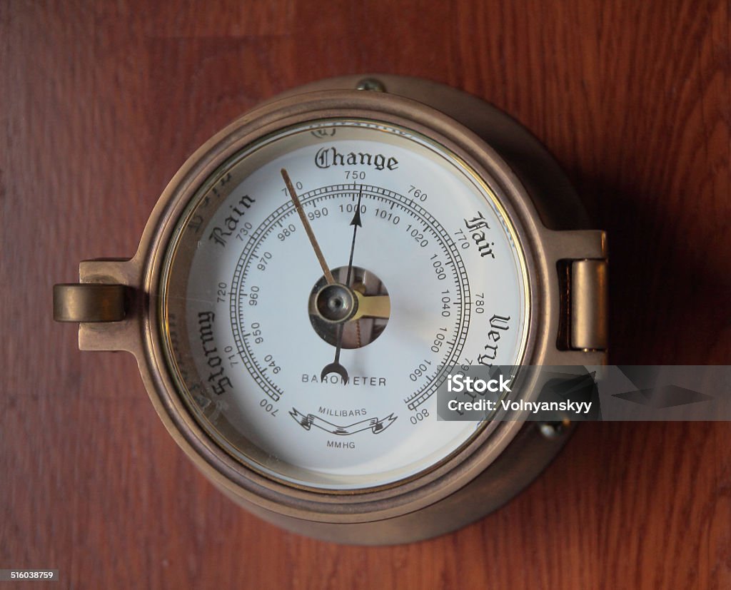Barometer Barometer on the wooden wall Barometer Stock Photo