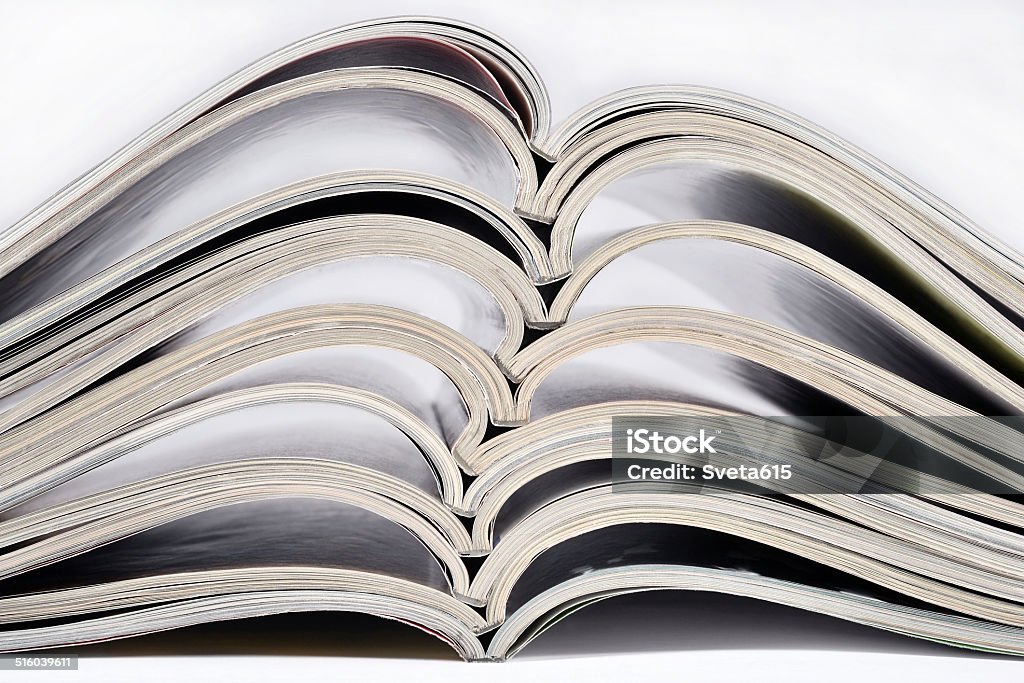 Stack of old magazines Stack of old magazines closeup Archives Stock Photo