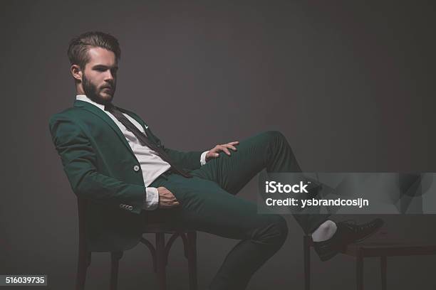 Fashion Man Wearing Green Suit With White Shirt Black A Stock Photo - Download Image Now