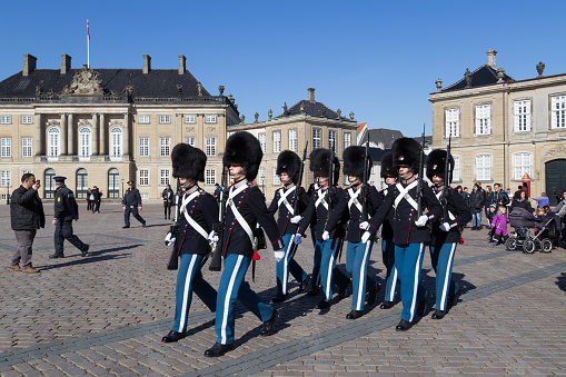 Copenhagen, Denmark, September 21, 2021: Traditional changing of guards at noon in front of  the royal palace of Amalienborg.
