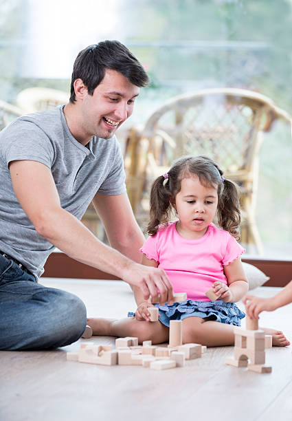 istock Young family at home 516040041