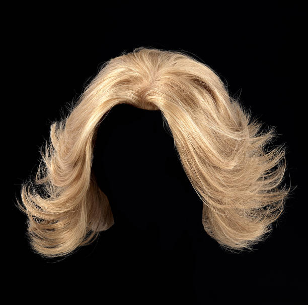 blonde wig blonde wig for women on a black background razor blade photos stock pictures, royalty-free photos & images
