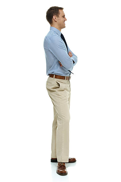 istock Smiling businessman standing with arms crossed 516042235