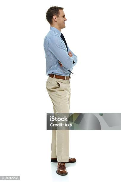 Smiling Businessman Standing With Arms Crossed Stock Photo - Download Image Now - 20-24 Years, 20-29 Years, Adult