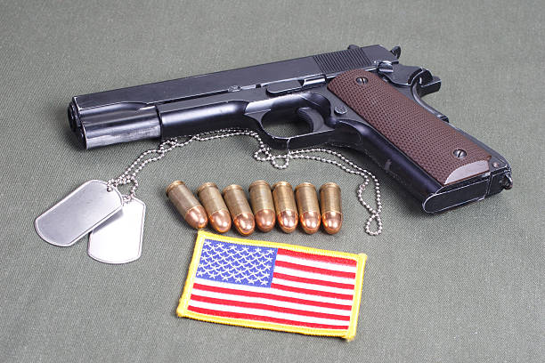 istock background with colt government m1911 516042629