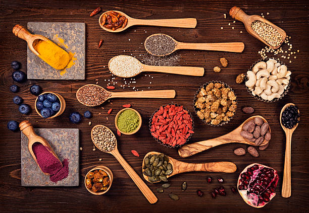 istock Super foods in spoons and bowls 516042952