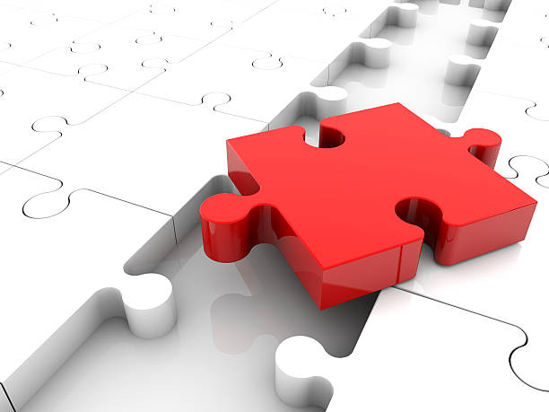 istock Red puzzle piece on white puzzle pieces 516043472