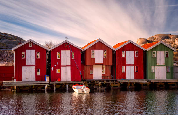istock Bohuslan boathouses in morning light 516045558