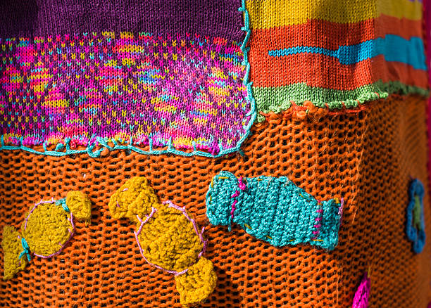 istock Funny colorful knitted sweater textures close up 516045732