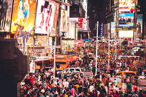 istock People and traffic in Times Square 516060981