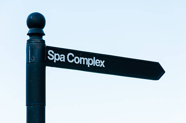 istock Old metal signpost directing to spa complex 516061377