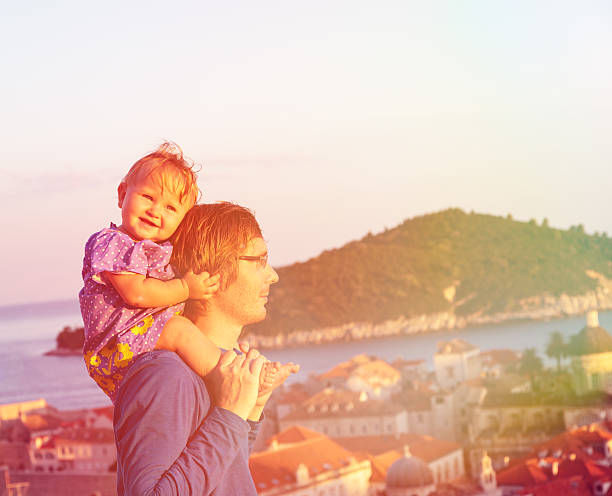istock father and daugther on vacation in europe 516061587