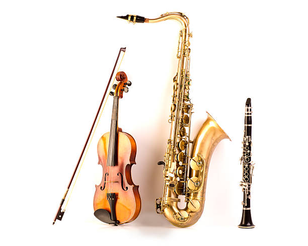 Sax tenor saxophone violin and clarinet in white Music Sax tenor saxophone violin and clarinet in white background violin photos stock pictures, royalty-free photos & images