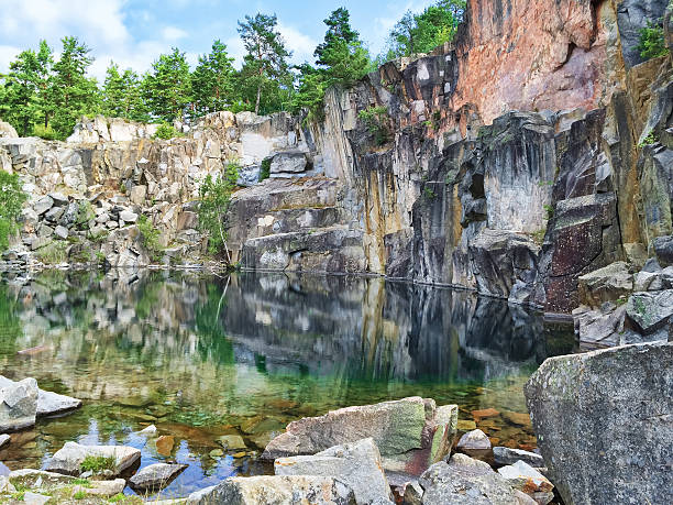 istock Picturesque lake in the ancient stone quarry 516064012