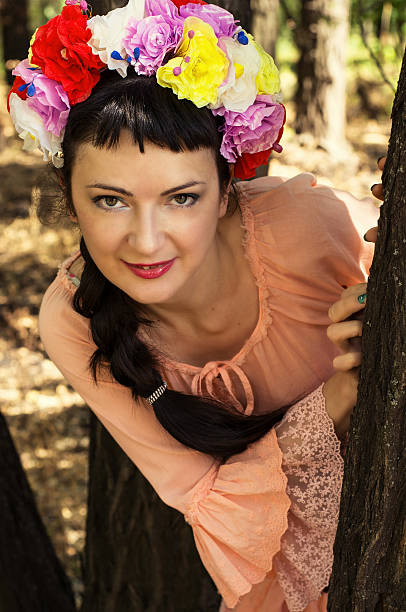 istock woman with a wreath on his head 516064319