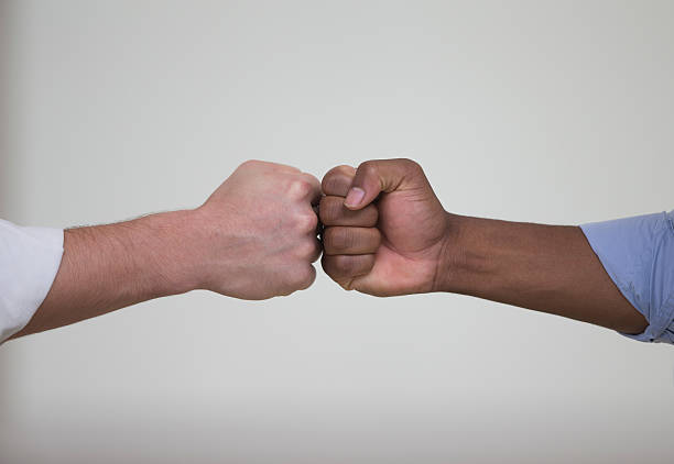 istock Cropped View of a Fist Bump 516064705