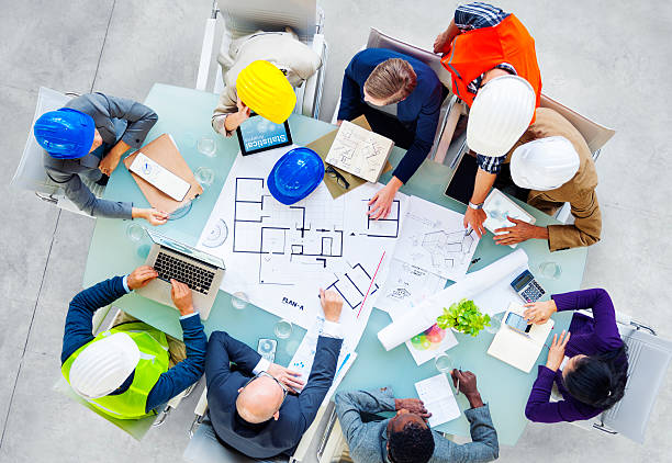 istock Architects and Designers Working in the Office 516065313