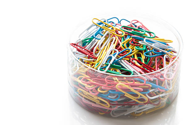 istock colorful paper clip against a white background 516065399