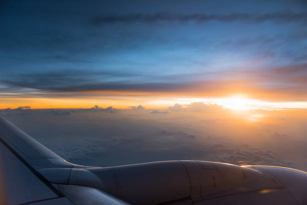 istock Last light over the wing tip of airplane 516065891