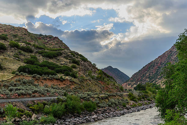 istock colorado river flowing through mountains 516066317
