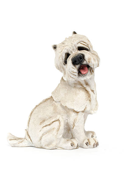 istock figurine a dog isolated on white 516068040