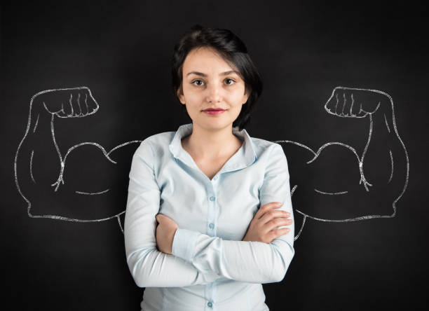 istock Young woman with drawn powerful arms 516069168