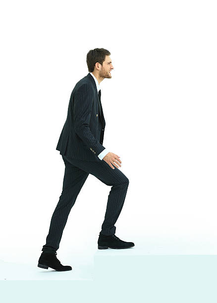 istock Businessman up the staircase over white background. 516071740