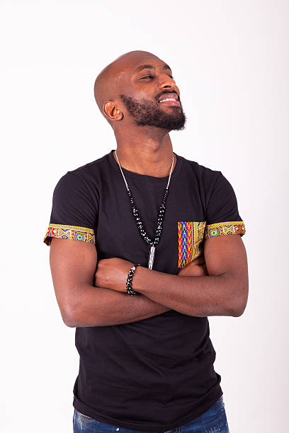 istock African American young man with folded arms holding traditional 516072726