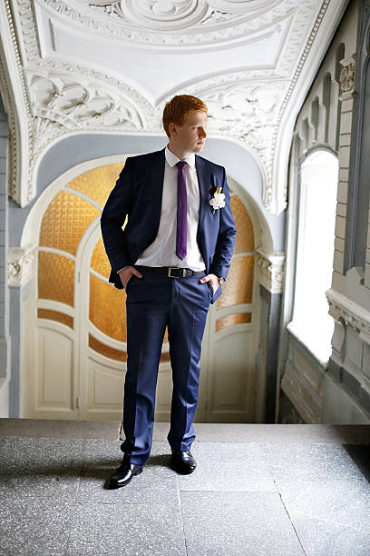 istock The groom in a lilac suit 516074916