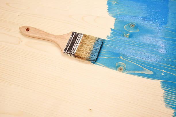istock Painting natural wood in blue 516075172