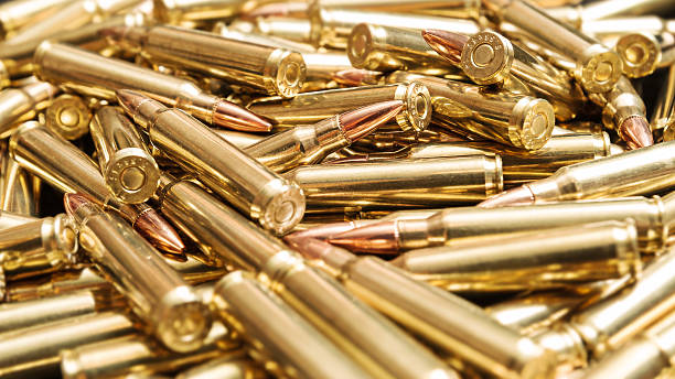 golden munition - rifle bullet war sport stock-fotos und bilder