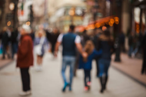 istock Blurred crowd in the city 516075812