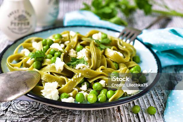 Spinach Pasta With Green Pea And Cheese Stock Photo - Download Image Now - Green Pea, Pasta, Recipe