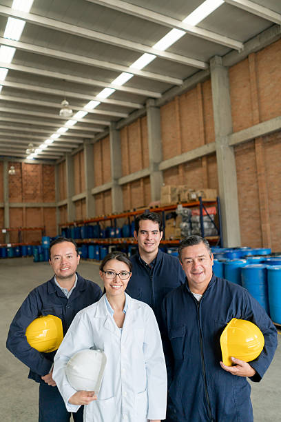 istock Group of people working at a chemical plant 516077164