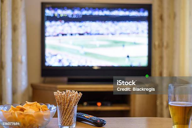 Television Tv Watching With Snacks And Alcohol Stock Photo - Download Image Now