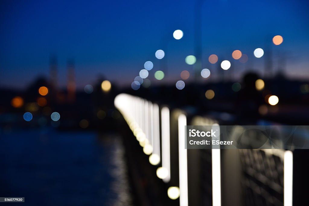 Blurry Istanbul Nights with Bokeh Lights of The Galata Bridge Blurry Istanbul nights with bokeh lights of The Galata Bridge Abstract Stock Photo