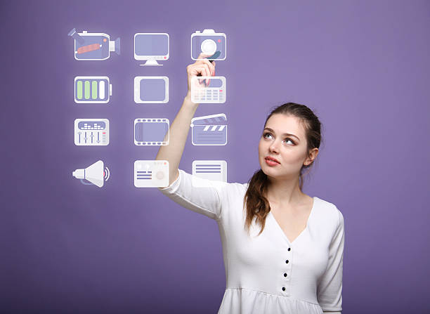 istock Woman pressing high tech type of modern multimedia buttons on 516079338