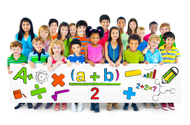 istock Kids Holding Board with Mathematical Symbols 516079615
