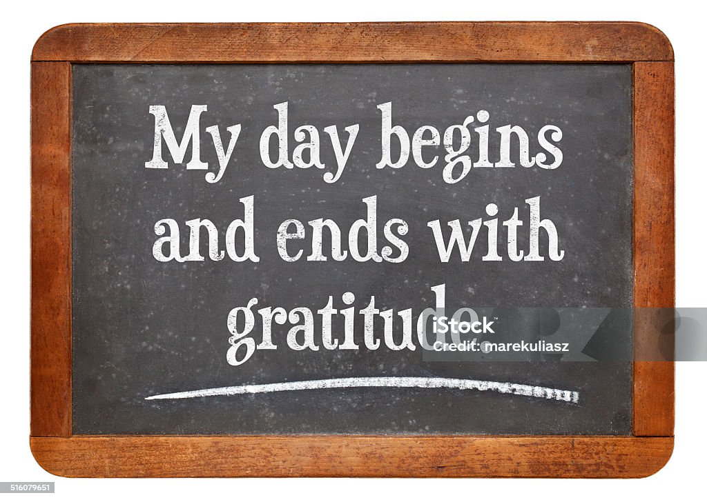 positive affirmation words My day begins and ends with gratitude - positive affirmation words on a vintage slate blackboard Attitude Stock Photo
