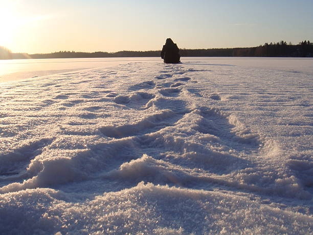 istock Men on Frozen Lake 516079919