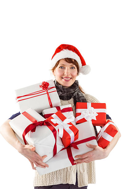 istock Woman holding lots of presents 516080017